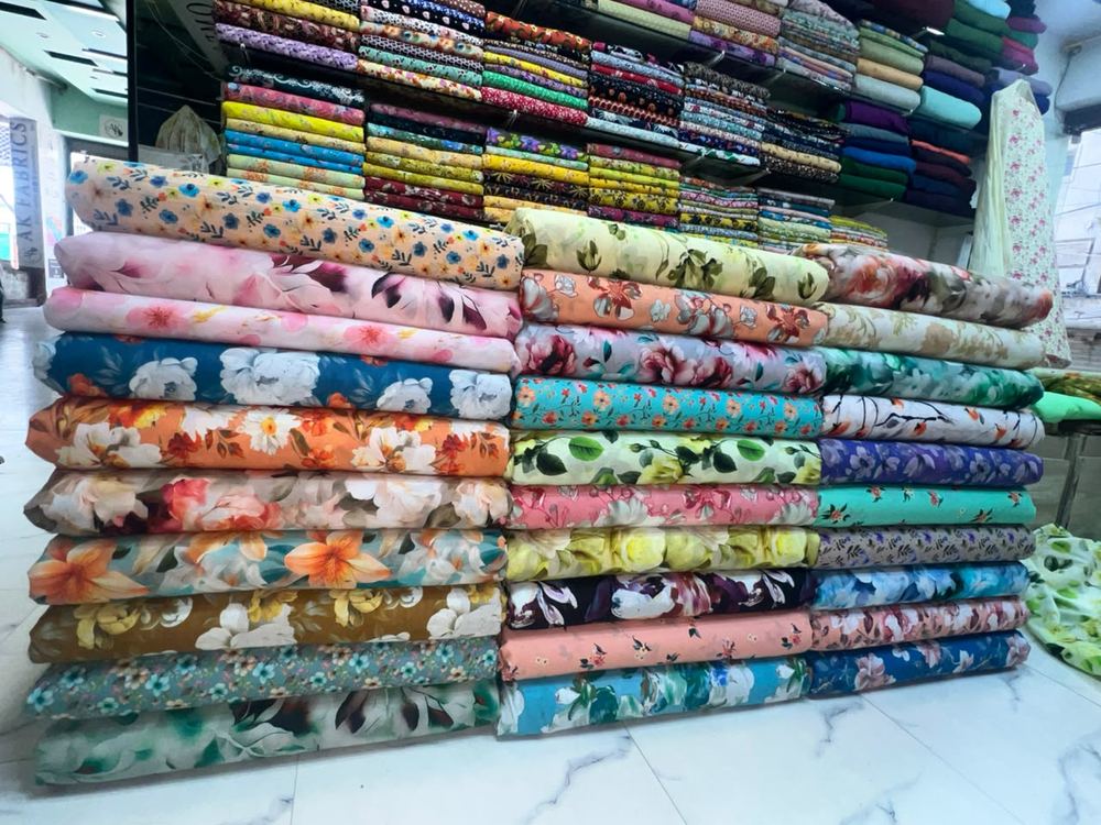 Fabric rolls displayed at AK Fabrics store
